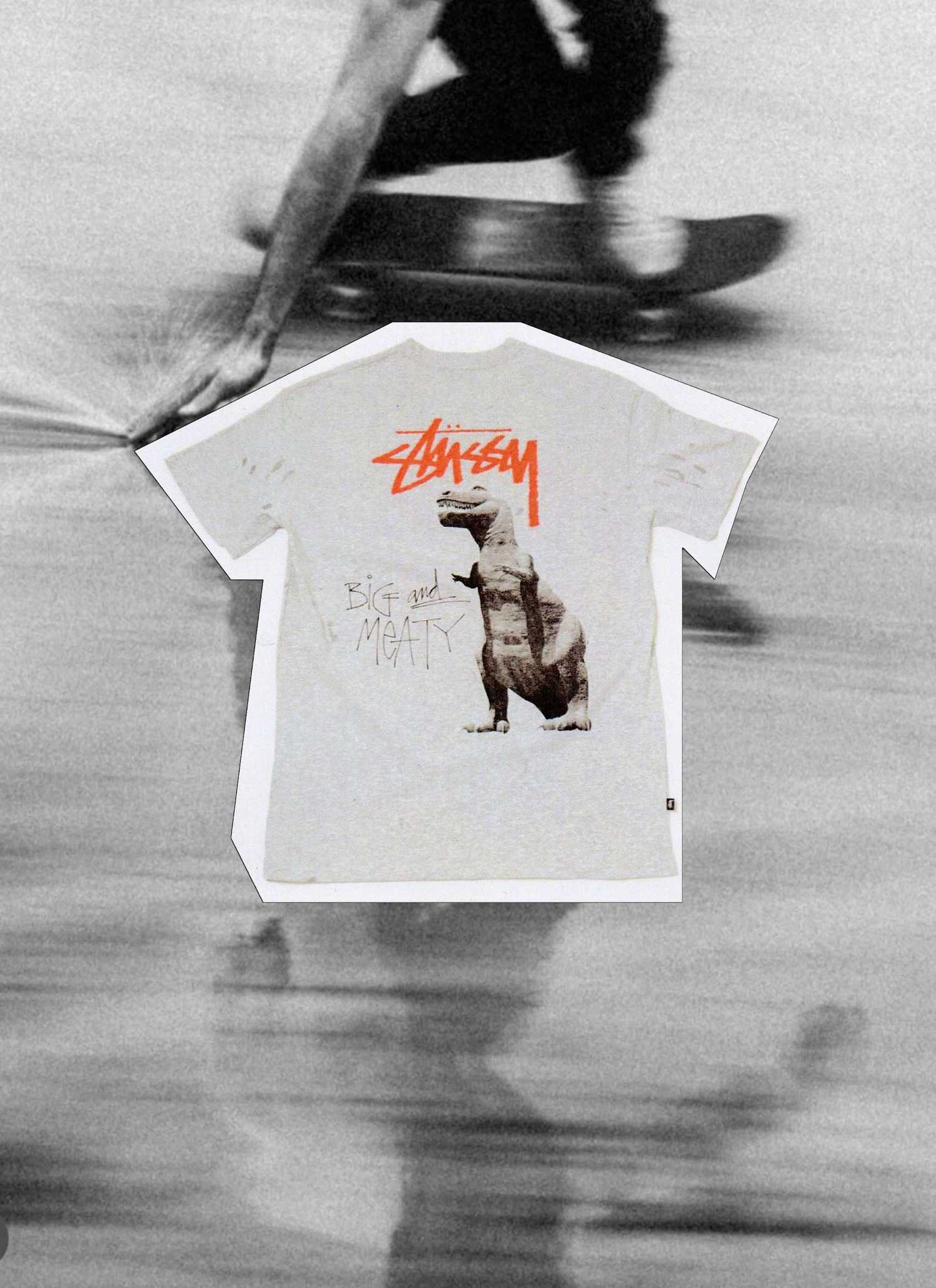 Stussy t-shirt featuring a "Big and Meaty" dinosaur graphic