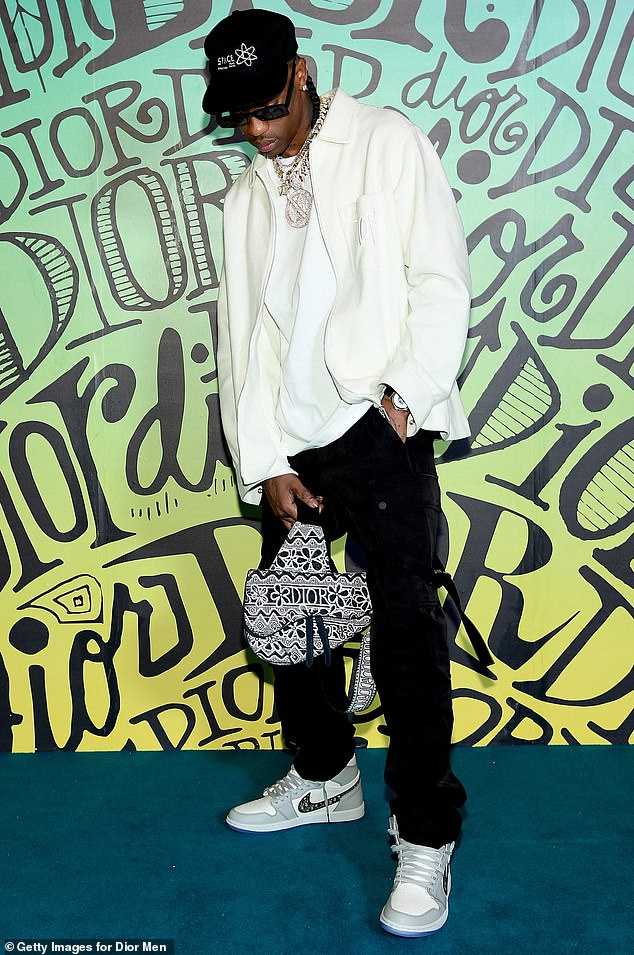 Travis Scott at the Dior Event in Miami wearing the unreleased Jordans